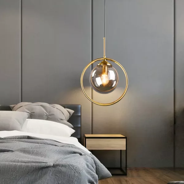 Abat jour led en forme de boule en verre lustre suspendu au dessus d'un lit