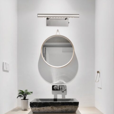 Applique murale salle de bain imperméable présenté au-dessus d'un miroir oval