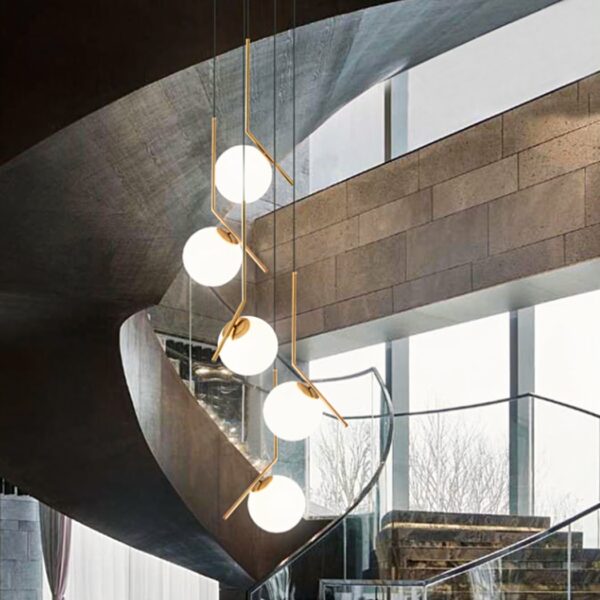 Lustre pendant 5 boules LED suspendue au design moderne dans une piece style loft