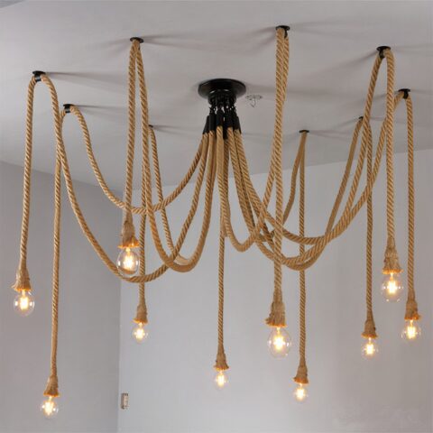 Suspension araignée en corde vintage présentée sur fond gris