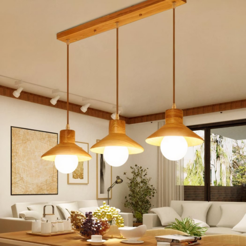 Suspension en bois style nordique, composé de 3 lampes suspendu en bois dans une salle à manger