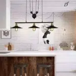 Suspension industrielle vintage noires à 3 lampes avec poulie en métal noir - vue de côté