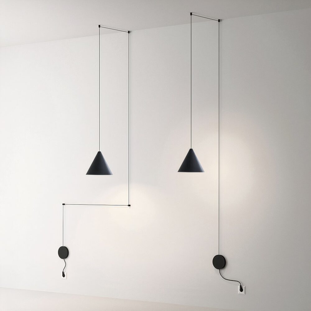 Suspension minimaliste moderne avec fil apparent décoratif présentée sur un mur blanc