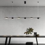 Suspension salle à manger au design moderne à six têtes sur fond gris
