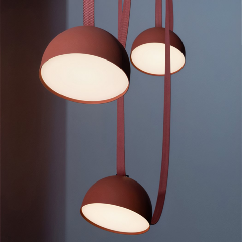 Suspension terracotta créative à trois têtes de style moderne sur fond gris