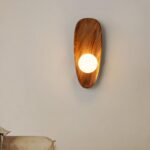 Applique murale en bois style coquillage avec sa perle lumineuse grand modèle - vue de face