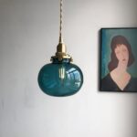 Suspension avec boule en verre bleu canard