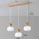 Lustre 3 suspensions rondes alignées — détail