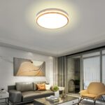 Suspension au design scandinave, ronde et élégante, avec des finitions en bois naturel, idéale pour un éclairage chaleureux et moderne.
