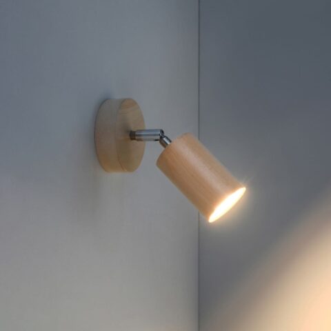 Applique murale spot orientable en bois naturel sur fond gris