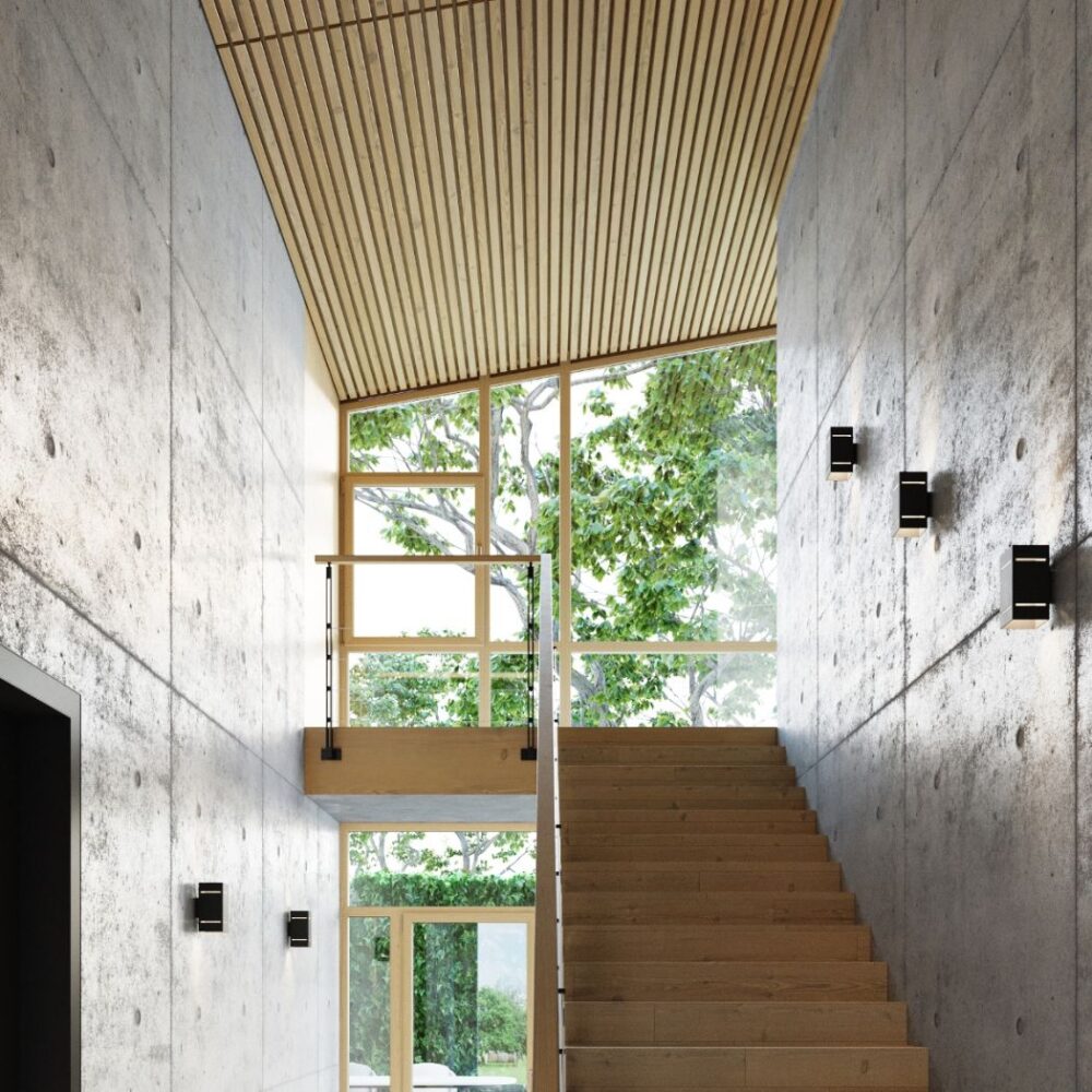 Cage d'escalier en béton avec plafond en lattes de bois et petites appliques murales sombres