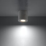 Lustre plafonnier rond en béton brut style industriel - vue de côté
