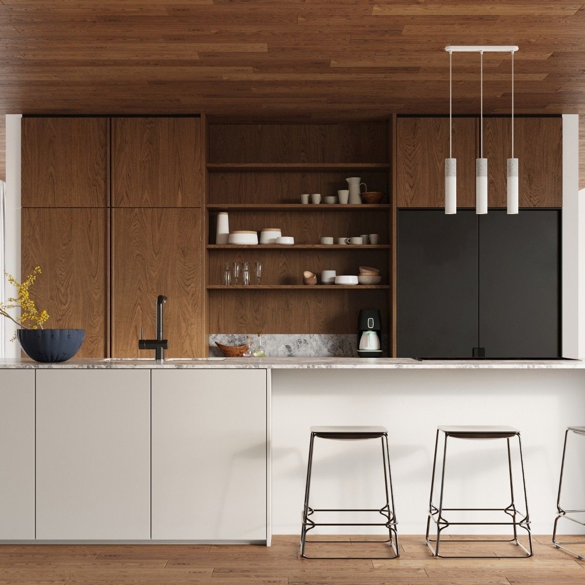 Cuisine en bois avec trois suspensions cylindriques au-dessus d'un îlot et étagère à vaisselle