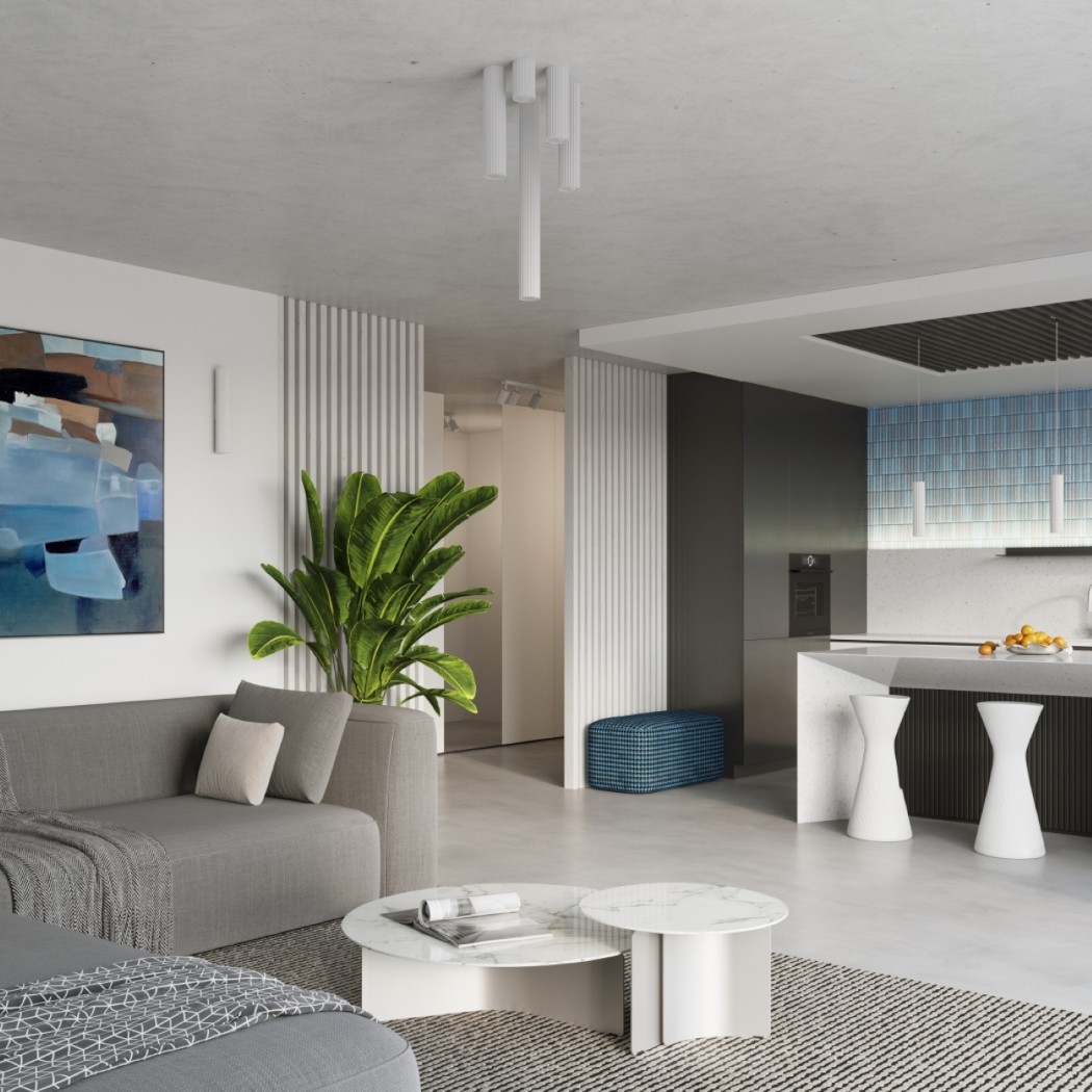 Plafonnier blanc tubulaire à hauteurs multiples dans un salon ouvert et moderne