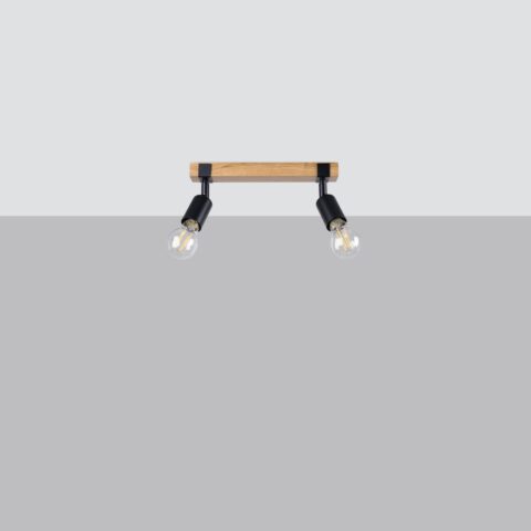 Lustre plafonnier industriel bois et métal à spots orientables doté de 2 lampes alignés et fixés sur une base rectangulaire en bois clair sur fond gris et plafond gris-blanc.