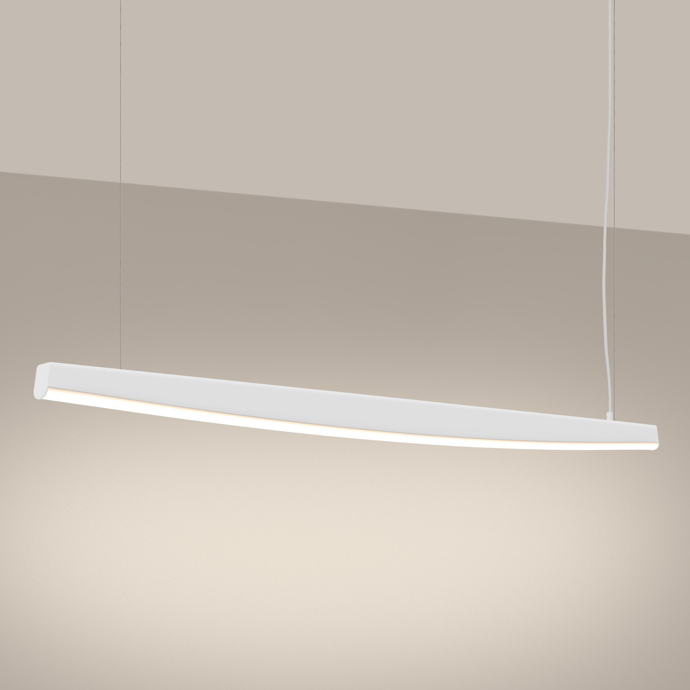 La suspension LED linéaire vague 3 coloris de couleur blanche suspendue au plafond par deux fils métalliques.