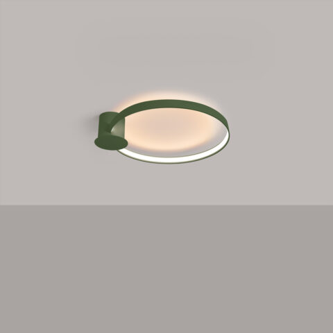 Le lustre plafonnier anneau LED vert statement design fixé sur un plafond gris.