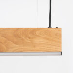Suspension linéaire chêne design moderne — vue en situation